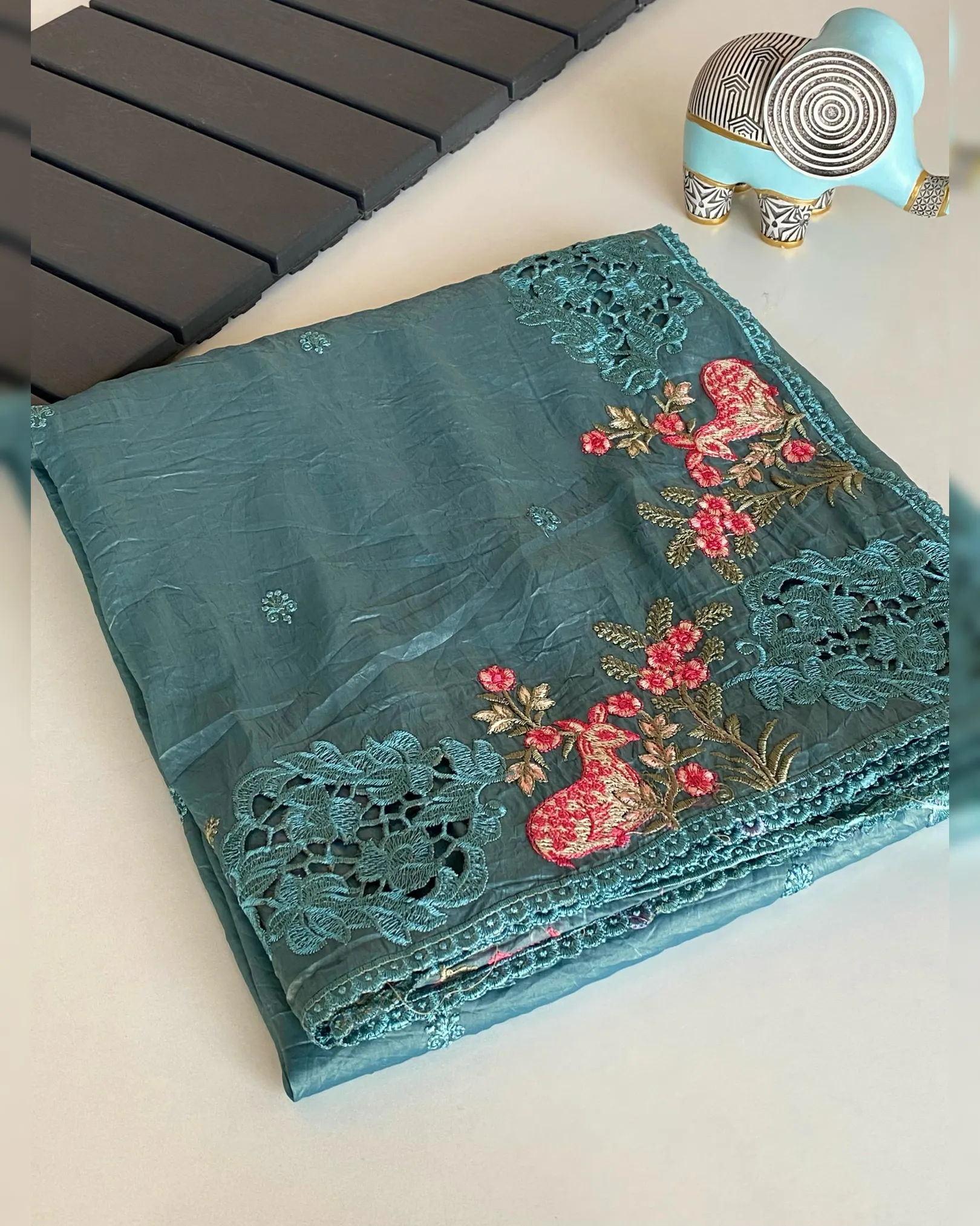 Pure crush silk saree with all over embroidery design and cut work design.